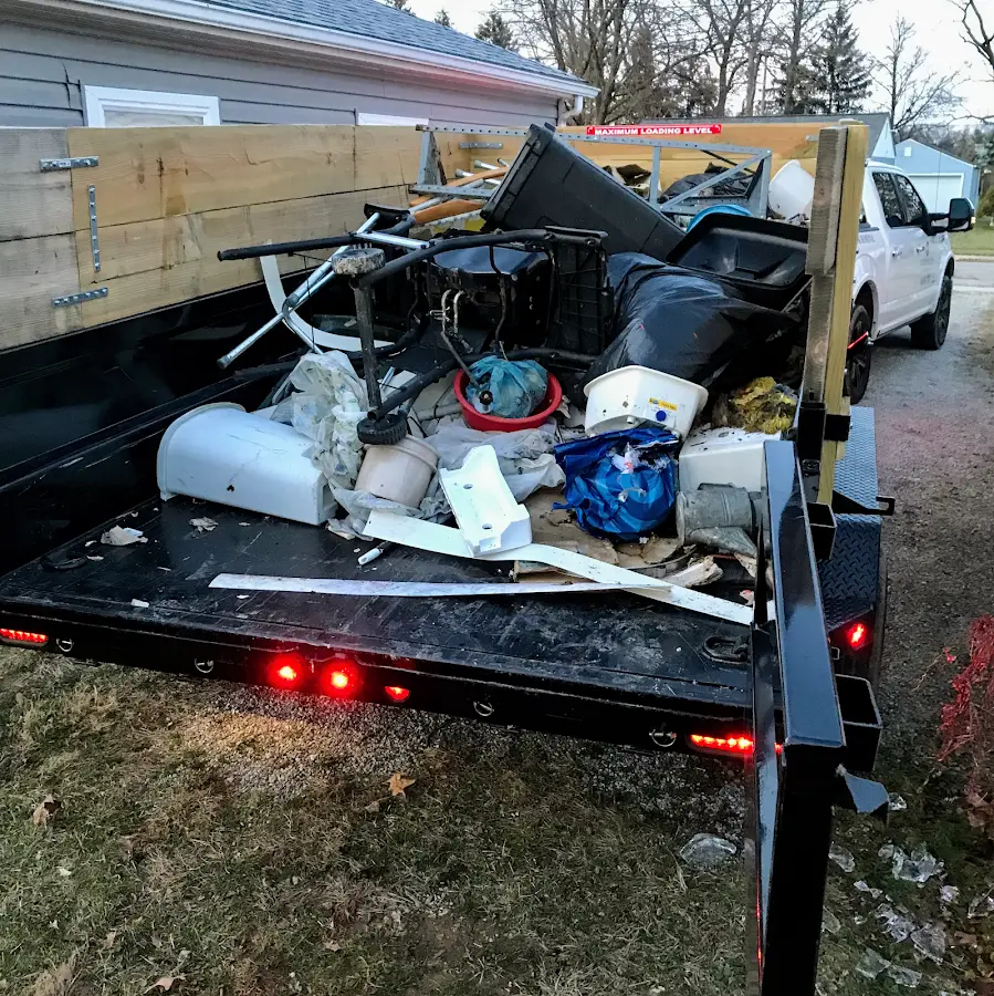Roll-off dumpster delivered to a residential driveway in Gardiner